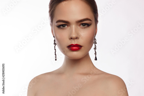 Wellness, cosmetics and romantic retro style. Close-up portrait of sensuality beautiful blond woman model face with fashion make-up, sexy evening red lips makeup and bright red manicure