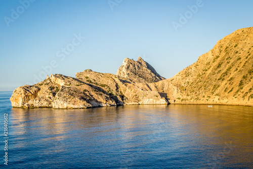 Jebha island and waves and rocks