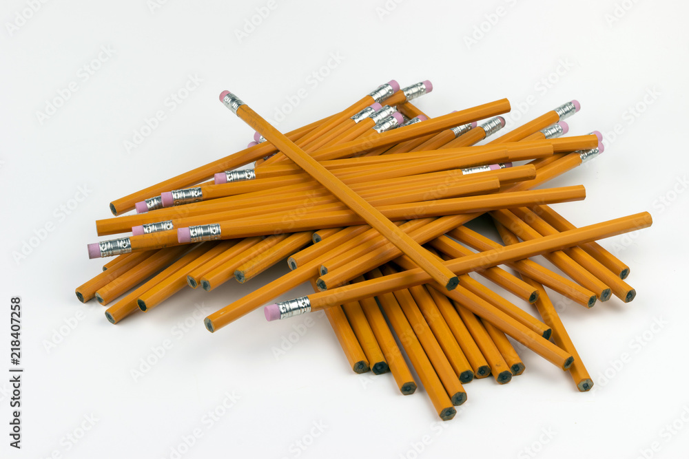 Jumbled stack of orange pencils