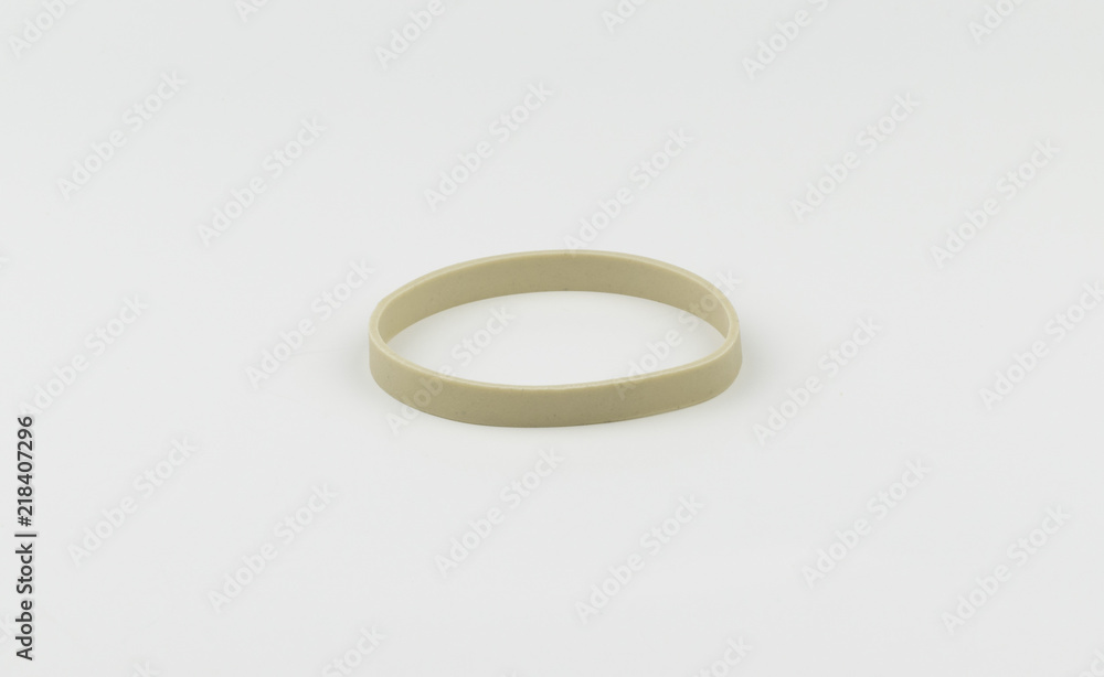 Single latex rubber band on a white background Single latex rubber band on a white background