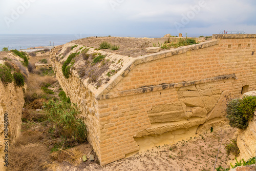 Kalkara, Malta. Fort Rinella on the beach and the surrounding moat, 1879-1884.