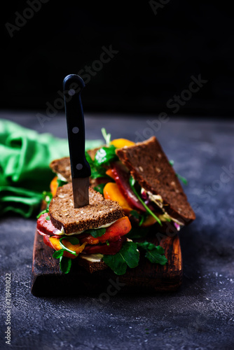 Fotografie peach and pastrami sandwiches with peppery mayo.