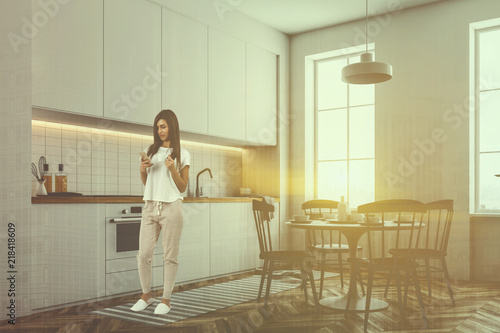 White kitchen countertops and table  woman