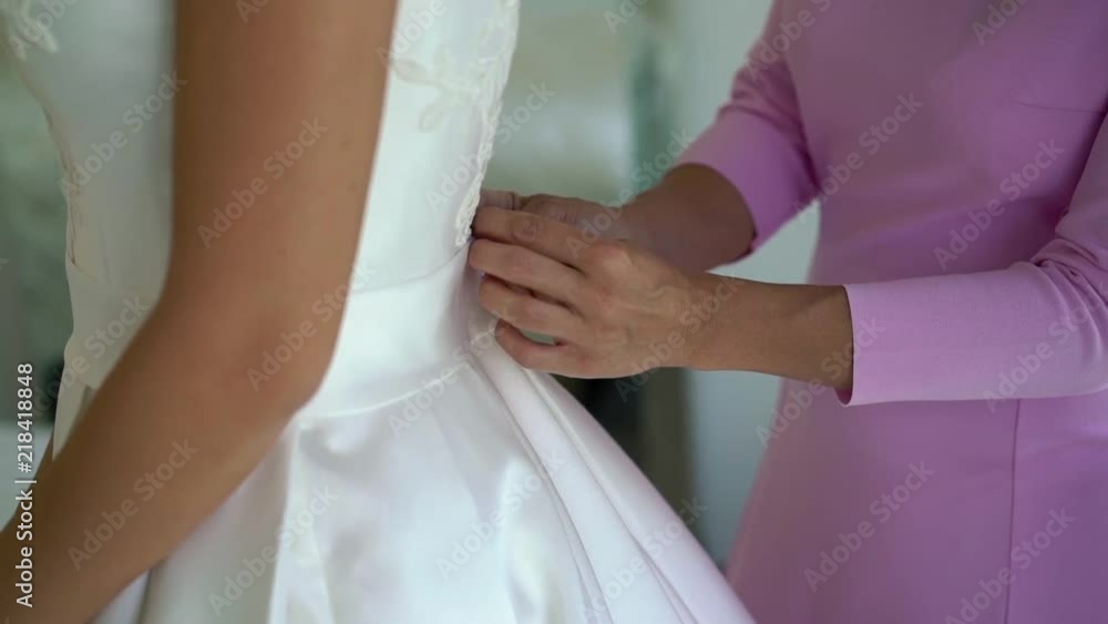 Young woman wearing bridal dress at wedding day Young woman wearing bridal dress at wedding day