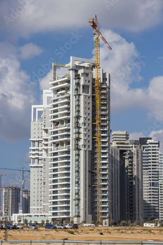 Construction of a skyscraper with a crane