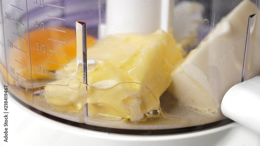 Adding eggs in blender. Cooking baked goods Adding eggs in blender. Cooking baked goods