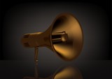 Golden speaker on a black
