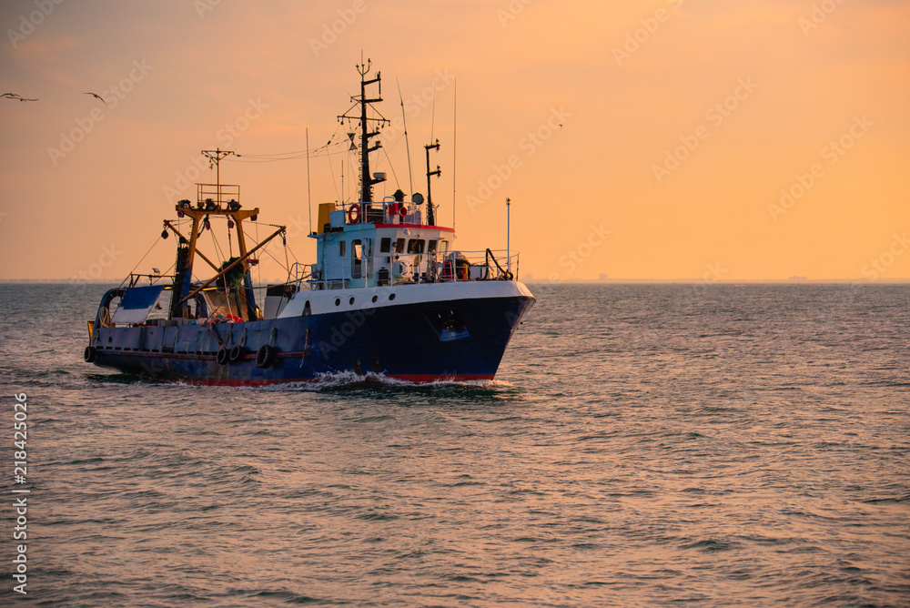 Sunrise and fishing boat Sunrise and fishing boat