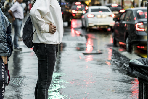 close up people walking in the city street during the heavy rain © Mihail