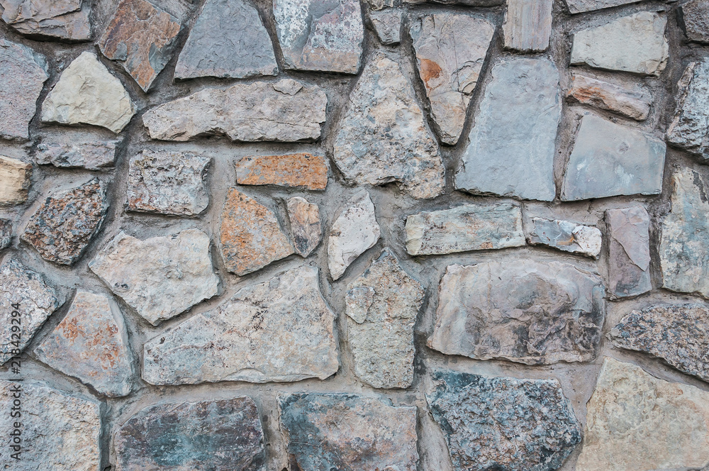 natural stone paving stone road from asphalt background summer