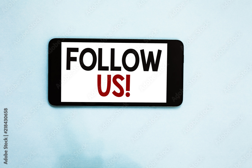 Text sign showing Follow Us. Conceptual photo Act of person to invite an individual or group to join his company Cell phone white screen over light blue background text messages apps. Text sign showing Follow Us. Conceptual photo Act of person to invite an individual or group to join his company Cell phone white screen over light blue background text messages apps.