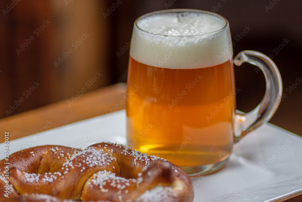 glass mug of beer and pretzel glass mug of beer and pretzel