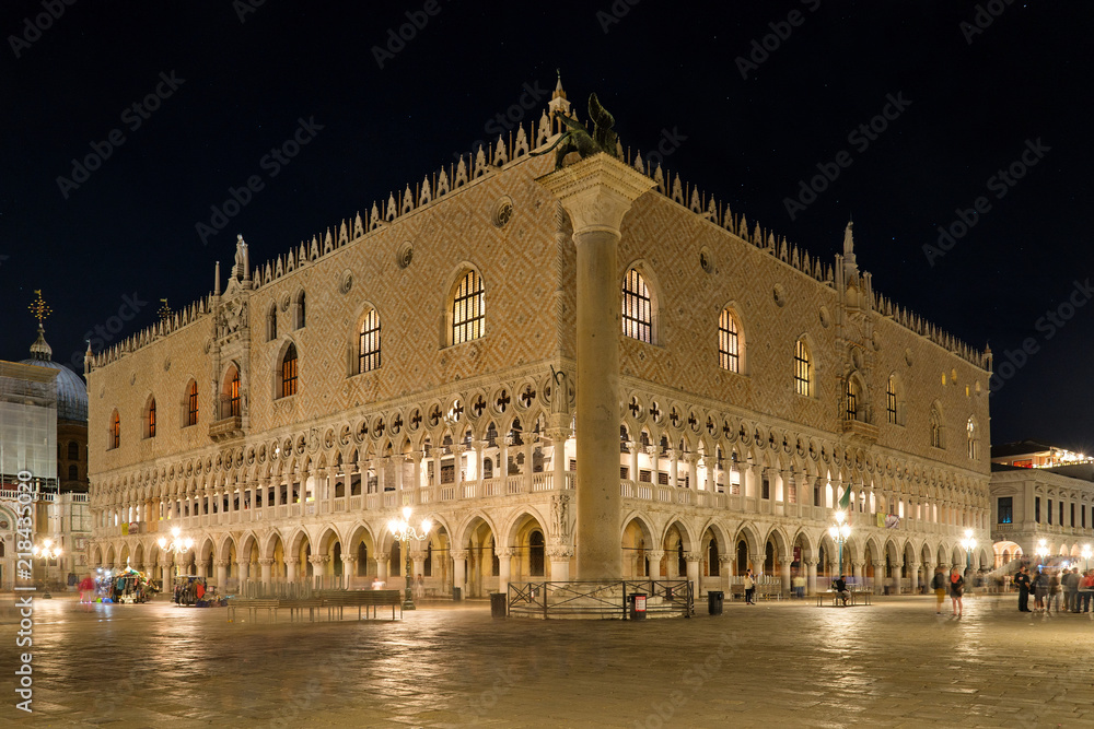Night view of St. Mark's Square ;Piazza San Marco, in front of Palazzo Ducale; Doge's Palace and Colonne di San Marco e San Teodoro, unique bronze and marble statues, in Venice, Italy.