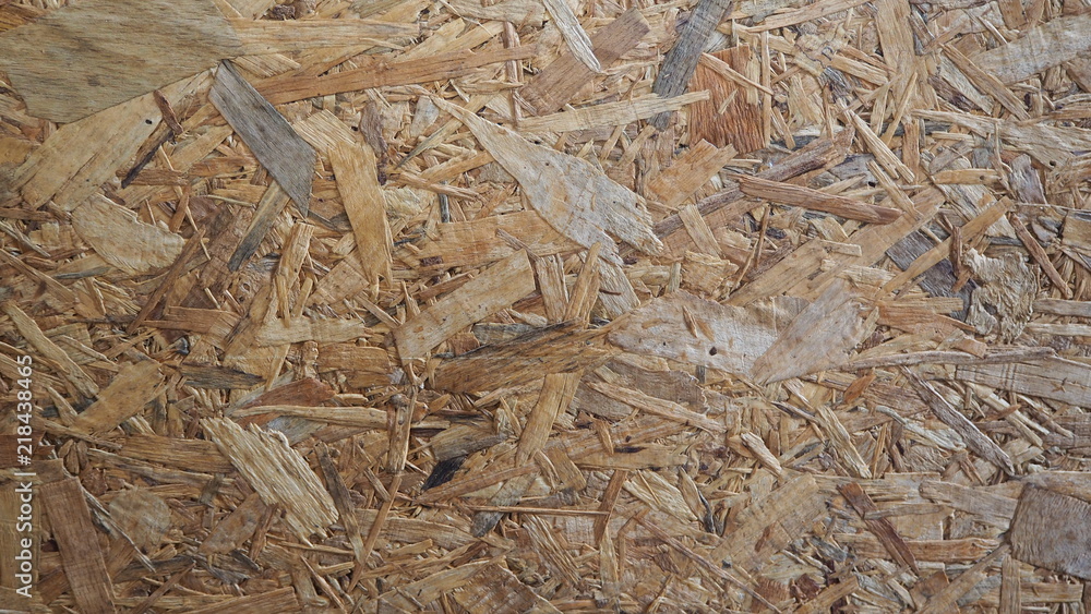 Particle Board wooden panel background made of wood chips. Board made of wood chips. Particle Board wooden panel background made of wood chips. Board made of wood chips.