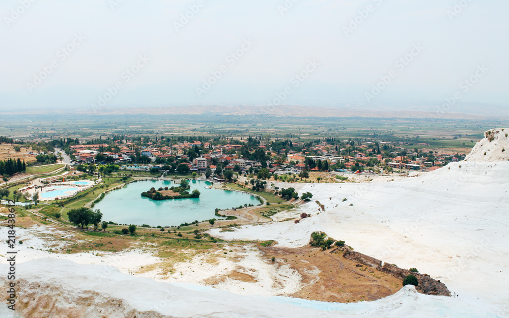 Travertines of Pamukkale and old town in Turkey