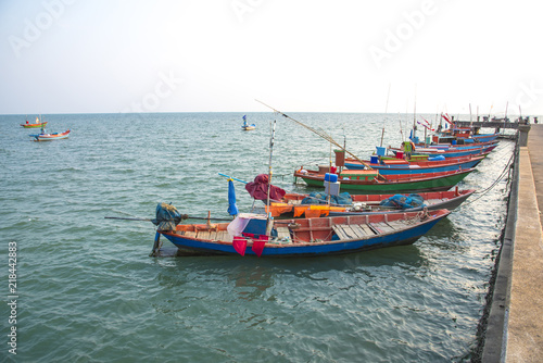 fishing boats pier at sea