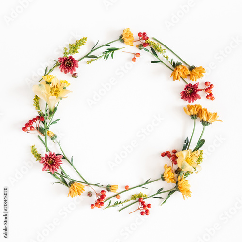 Autumn floral composition. Wreath made of fresh flowers on white background. Autumn, fall concept. Flat lay, top view, copy space, square © Flaffy