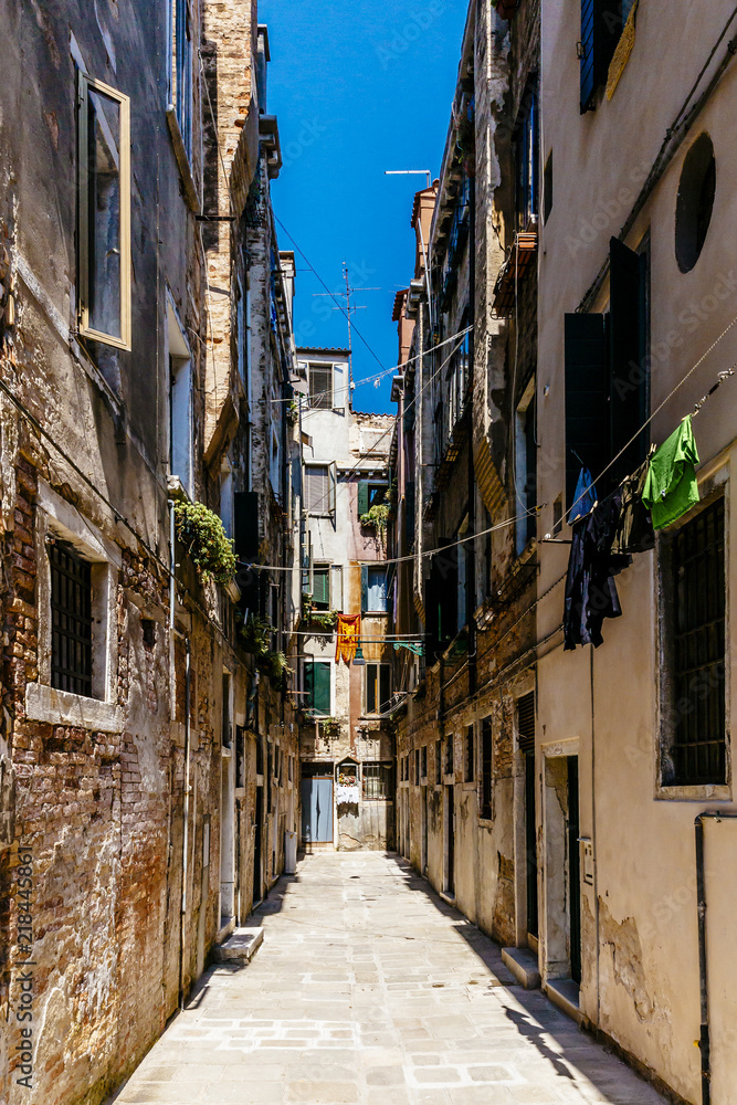 Narrow Alleyway in Venice, Italy with Venetian Houses