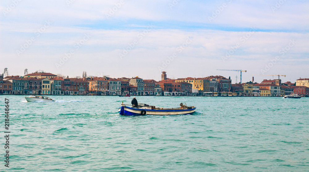 Fototapeta premium Fisherman boat in Venice Italy Panoramic