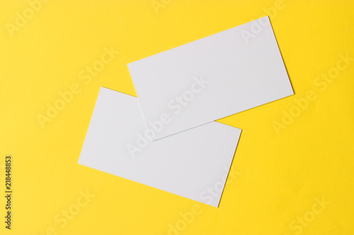 white business cards on a colored background.