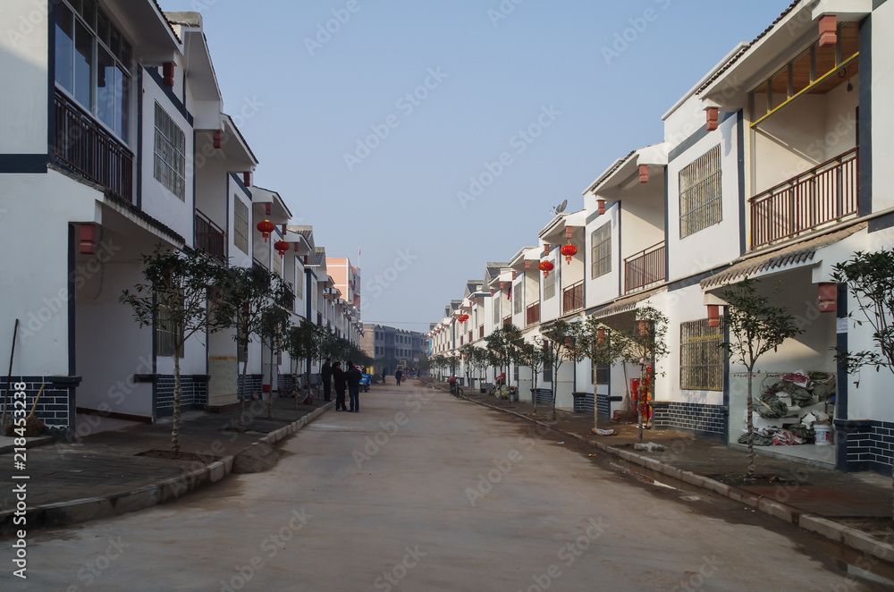 Rows of Houses on Both Sides of a Wide Street