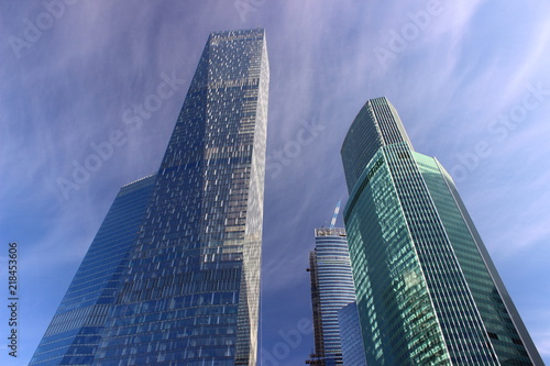 Moscow  Russia  perspective view from the  third ring road to the towers business center Moscow City -  the shiny skyscrapers against blue sky  modern architecture