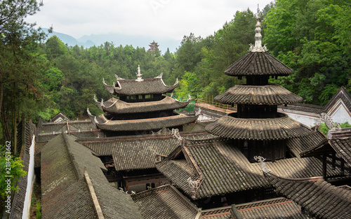 Palace roofs in Enshi Tusi imperial ancient city in Hubei China photo