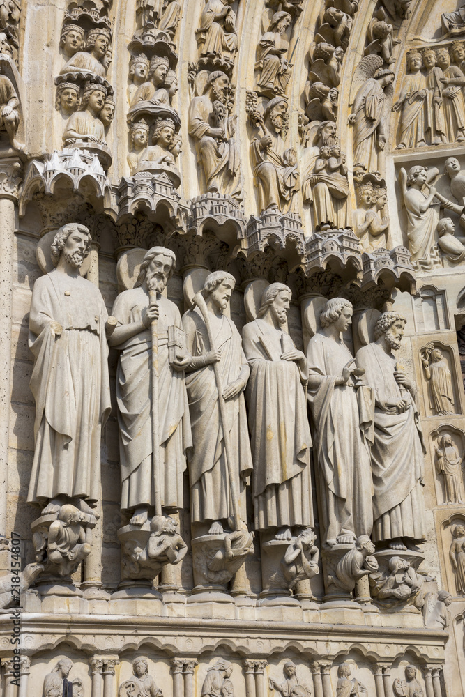 Sculptural figures on the facade of the Notre Dame Cathedral