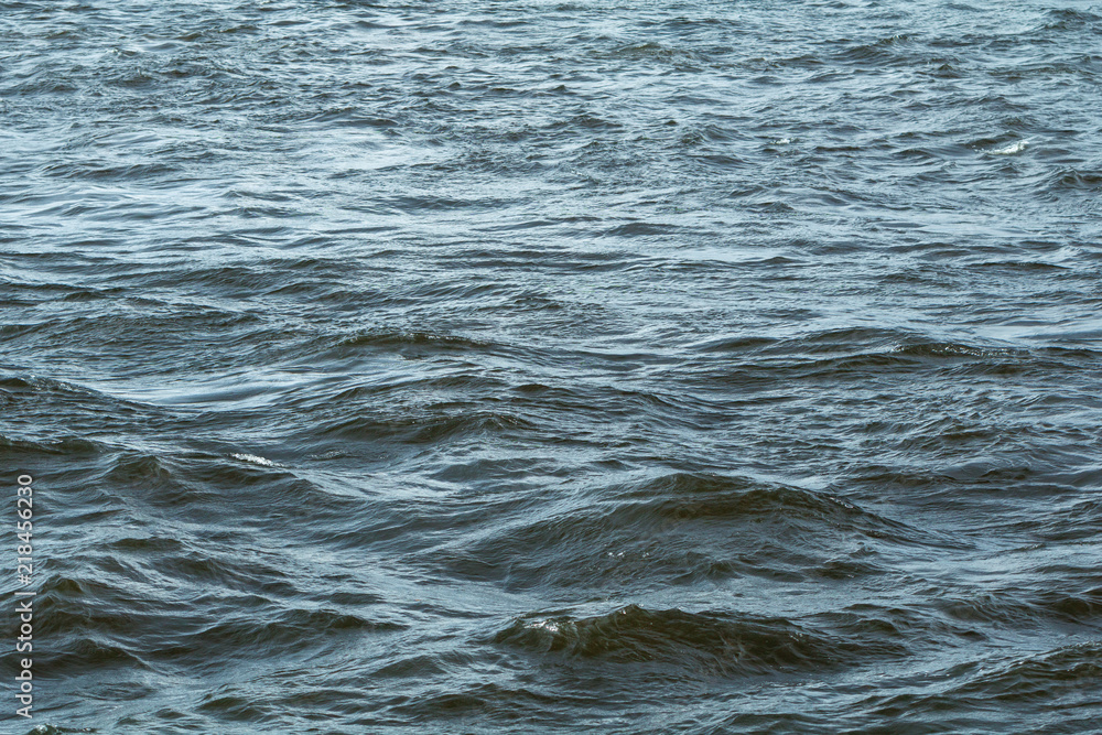 Low view on sea waves. Water background. Low view on sea waves. Water background.