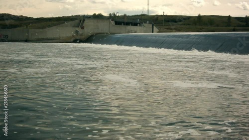 Group of birds flying around the Carseland weir in Alberta, Canada photo