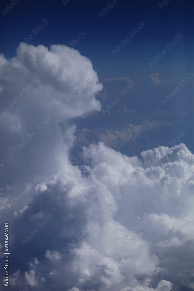 Obraz premium Небо. Облака. Земля с высоты. Виды из окна самолёта. Полёт. Поля облаков.