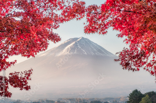 Mount Fuji with red Maple leaves cover in morning at Kawaguchiko lake