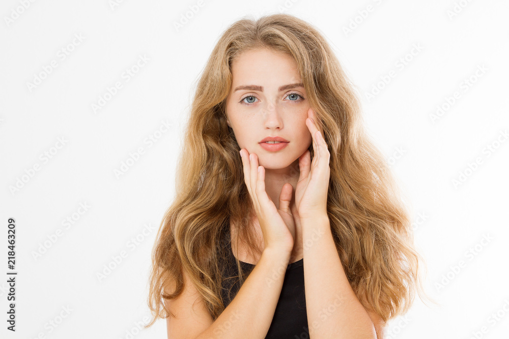Blonde girl with long and shiny wavy hair style isolated on white background. Young woman facial treatment. Cosmetology and skin care, beauty and spa concept. Copy space Blonde girl with long and shiny wavy hair style isolated on white background. Young woman facial treatment. Cosmetology and skin care, beauty and spa concept. Copy space
