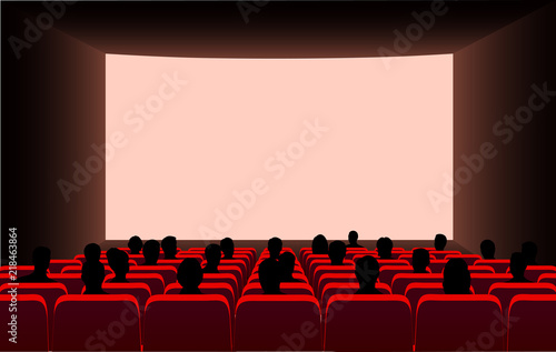 People in the cinema on the background of the screen.