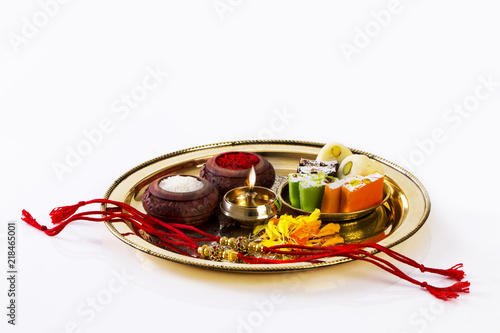 Raksha Bandhan rakhi with sweets diya and gift