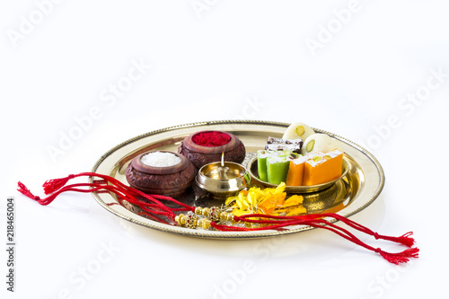 Raksha Bandhan rakhi with sweets diya and gift