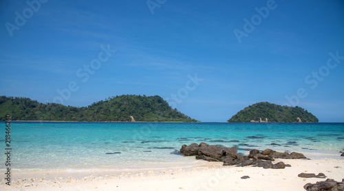 Fototapeta Naklejka Na Ścianę i Meble -  Landscape view of beautiful beach, sea sand sun at Lipe, Sa Toon province in south of Thailand with blue sky and white beach for relax, vacation and your long holidays to driving scuba tropical Island