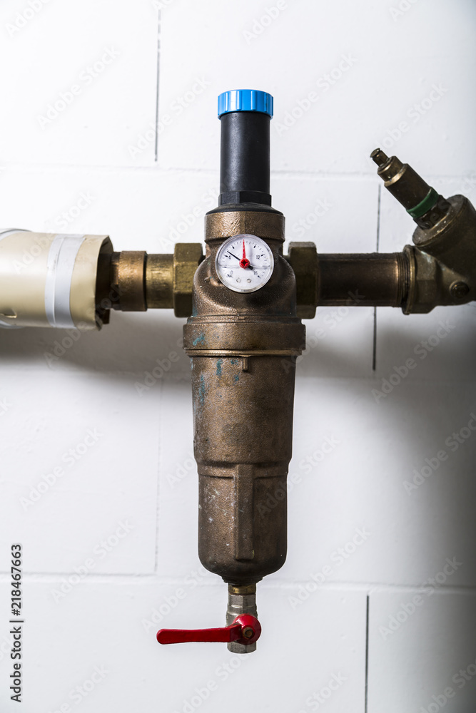 Water meters on metallic rusty water pipe Water meters on metallic rusty water pipe