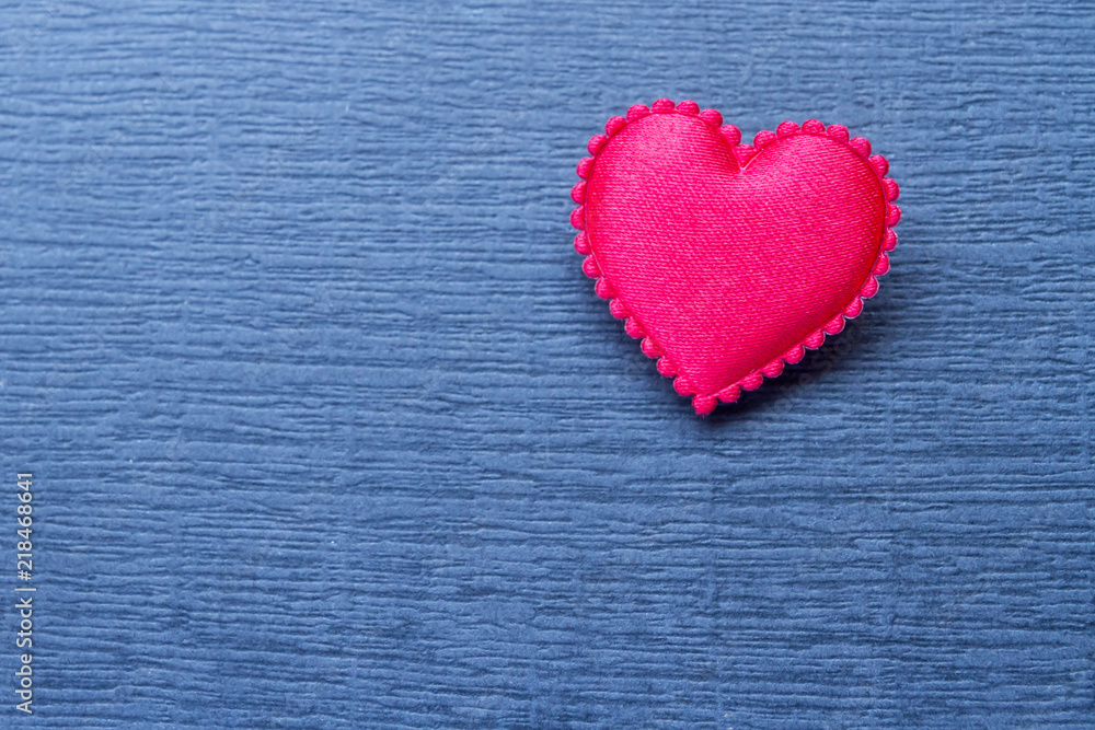 Red heart on gray surface Red heart on gray surface