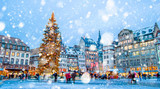 Christmas market under the snow in France, in Strasbourg, Alsace