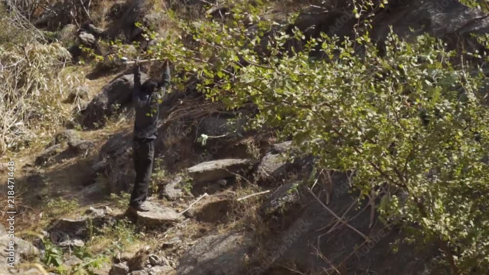 Man smashing rock with sledgehammer in Rajasthan. Man smashing rock with sledgehammer in Rajasthan.