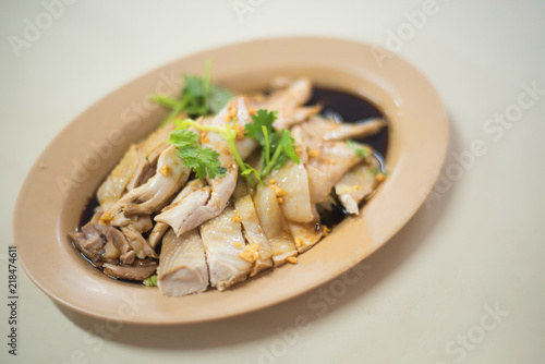 Steam chicken with sauce Chinese food style very delicious for eat with rice and famous especially in China town and Betong-Yala province, Thailand. Meat food for lunch or dinner.