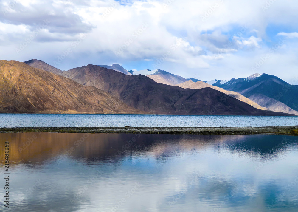 Pangong Lake or Pangong Tso with mountains reflection, Ladakh, India.
