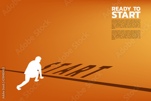 Silhouette of businessman ready to run from start line. Concept of people ready to start career and business