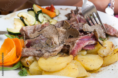 Istrian meat speciality - boskarin with truffles and potato photo