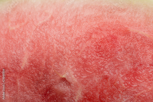 Juicy ripe watermelon texture. Ripe juicy summer fruit watermelon texture, wallpaper and background, top view.
