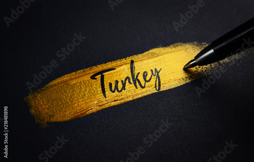 Turkey Handwriting Text on Golden Paint Brush Stroke