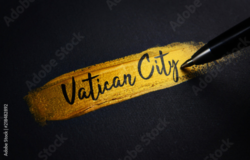Vatican City Handwriting Text on Golden Paint Brush Stroke