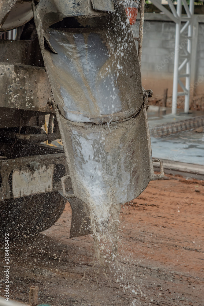 Washing a concrete truck in construction site Washing a concrete truck in construction site