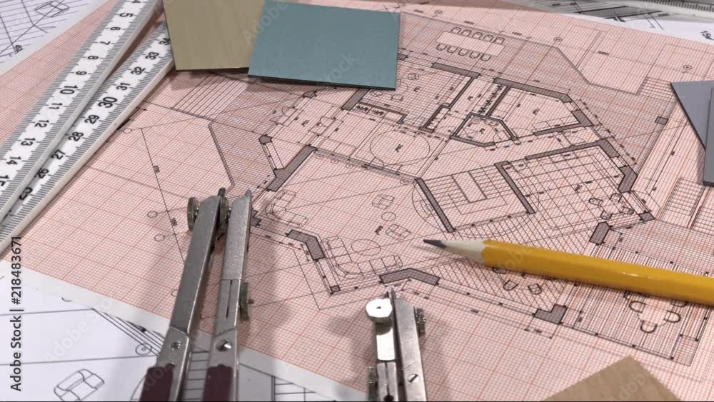 Blueprints: architectural drawings, yardstick - folding ruler & samples of modern interior decoration materials - decorative plastics smoothly rotate on the surface of the architectural plan Blueprints: architectural drawings, yardstick - folding ruler & samples of modern interior decoration materials - decorative plastics smoothly rotate on the surface of the architectural plan
